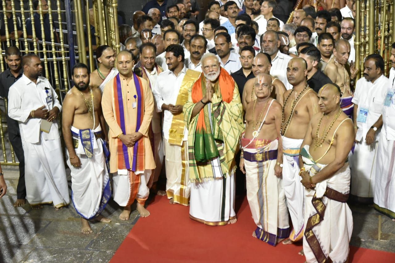 PM Narendramodi And CM Jagan Photos In Tirumala Tirupati