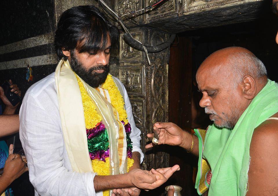 Pawan Kalyan offers prayers at a temple in Godavari region Photos