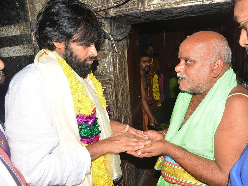 Pawan Kalyan offers prayers at a temple in Godavari region Photos