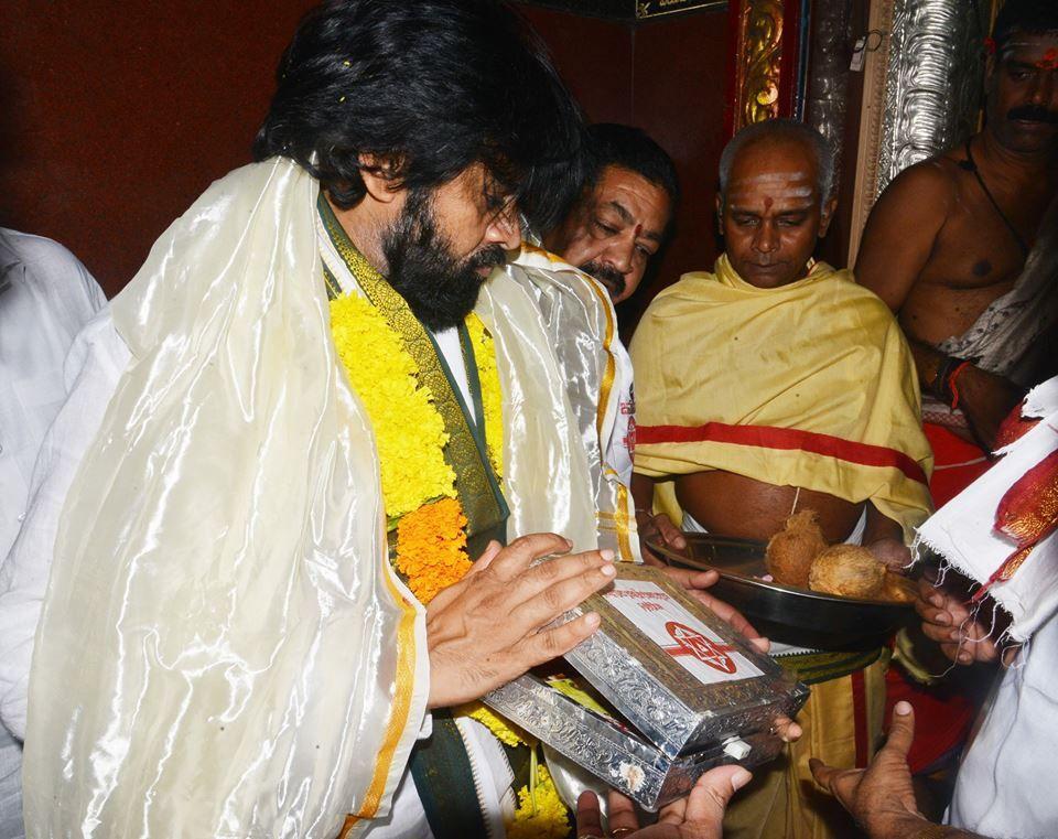 Pawan Kalyan offers prayers at a temple in Godavari region Photos