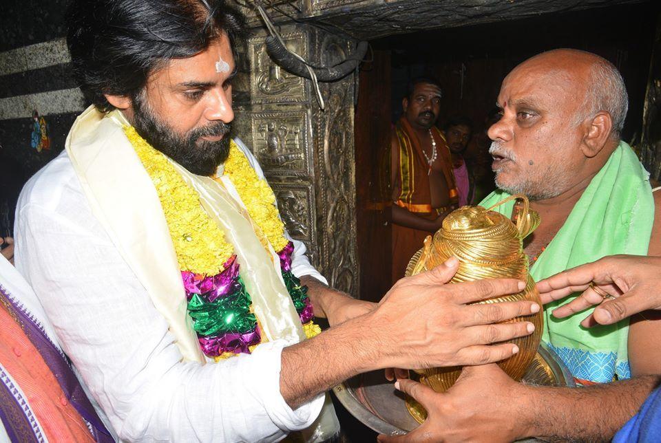 Pawan Kalyan offers prayers at a temple in Godavari region Photos