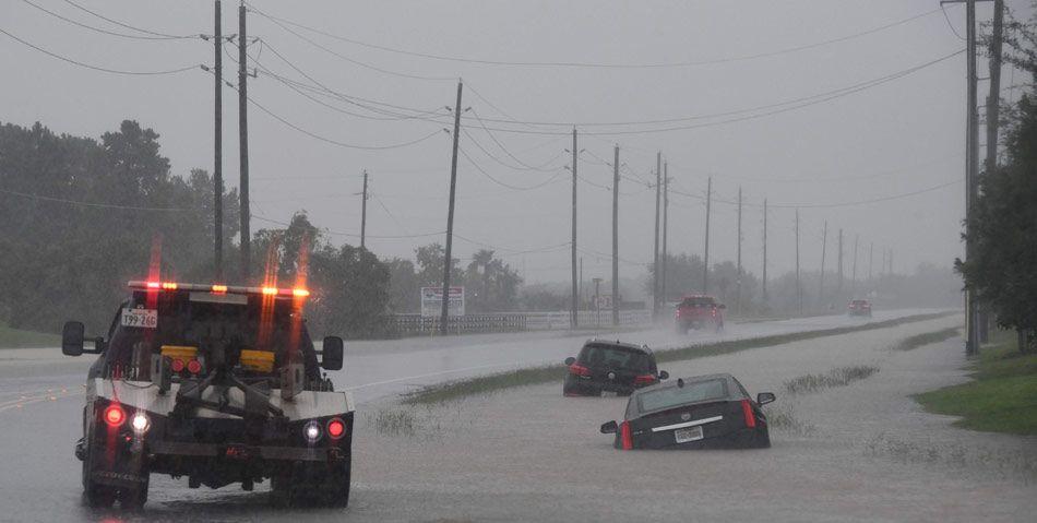 Planes floating on flooded tarmac at Houston airport