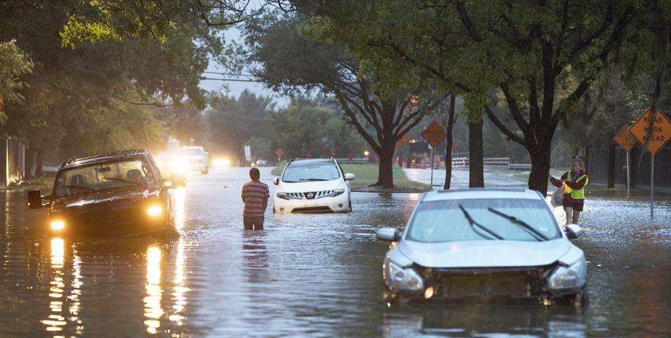 Planes floating on flooded tarmac at Houston airport