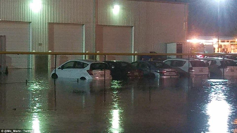 Planes floating on flooded tarmac at Houston airport