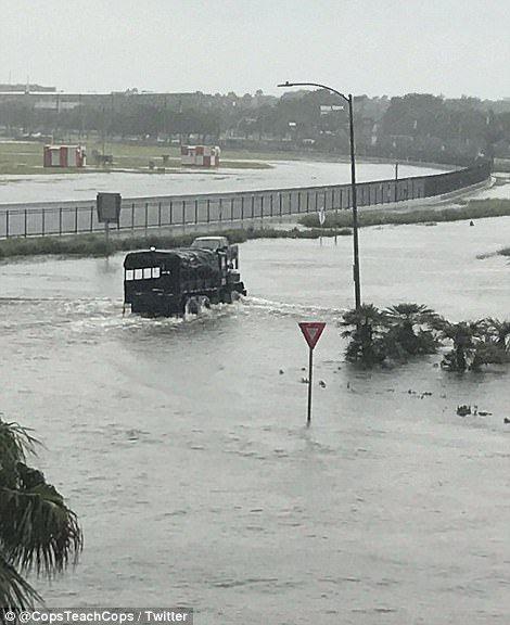 Planes floating on flooded tarmac at Houston airport