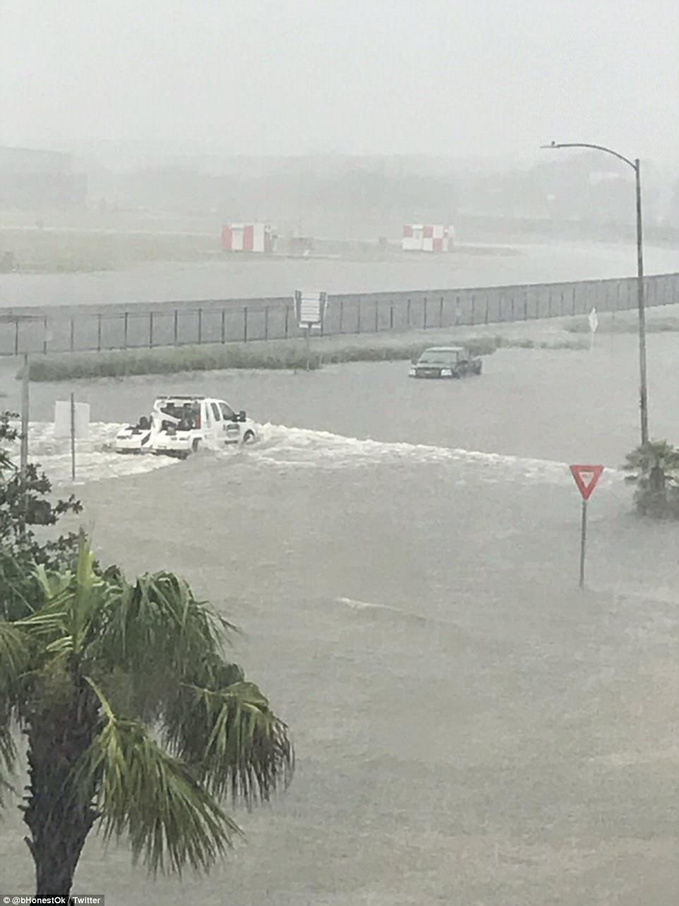 Planes floating on flooded tarmac at Houston airport