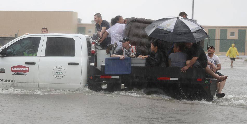 Planes floating on flooded tarmac at Houston airport