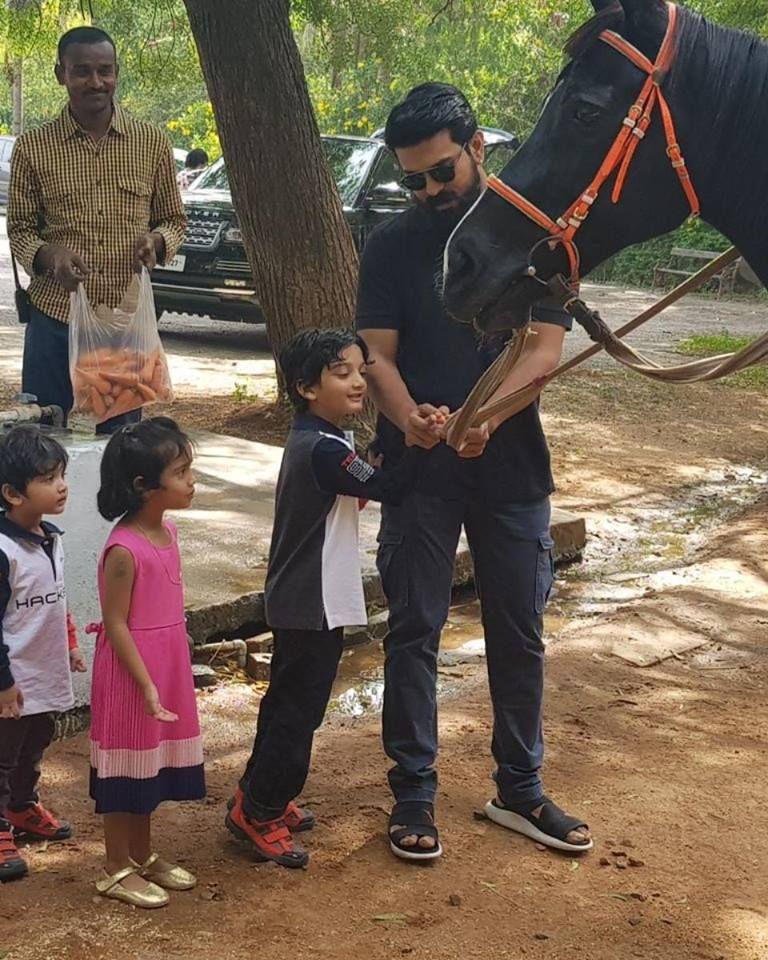 Ram Charan with Director Surender Reddy's Son Photos