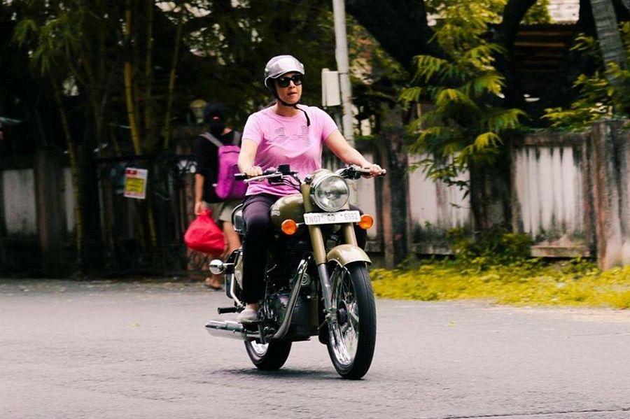 Surya teaching Jyothika to ride a bike Photos