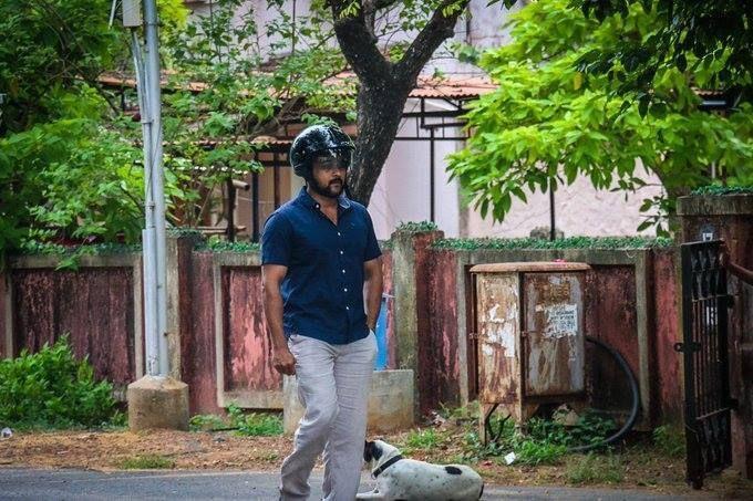 Surya teaching Jyothika to ride a bike Photos