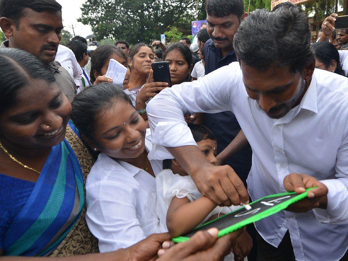 YS Jagan Continuous Padayatra In Rain Photos