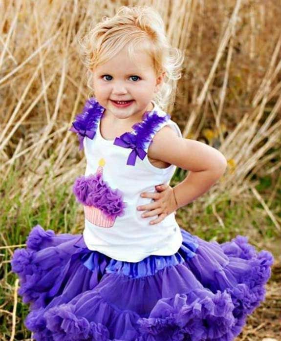 Cute Baby Girl In Purple Dress