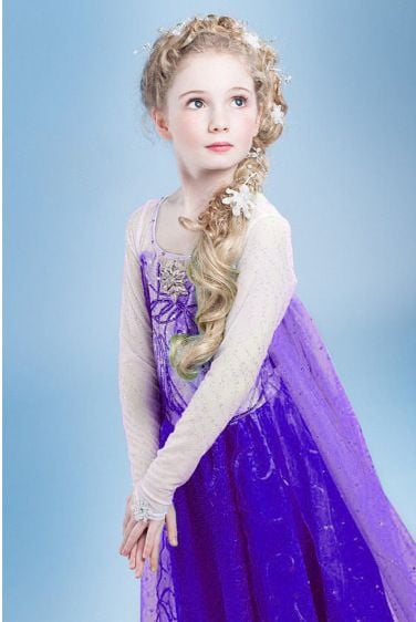 Cute Baby Girl In Purple Dress