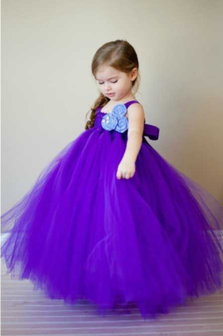 Cute Baby Girl In Purple Dress
