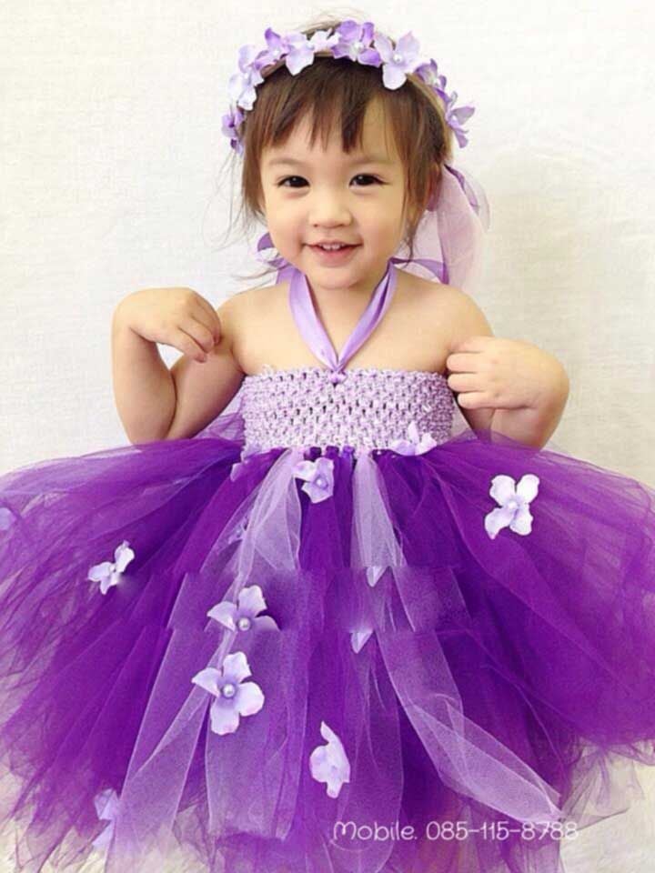Cute Baby Girl In Purple Dress