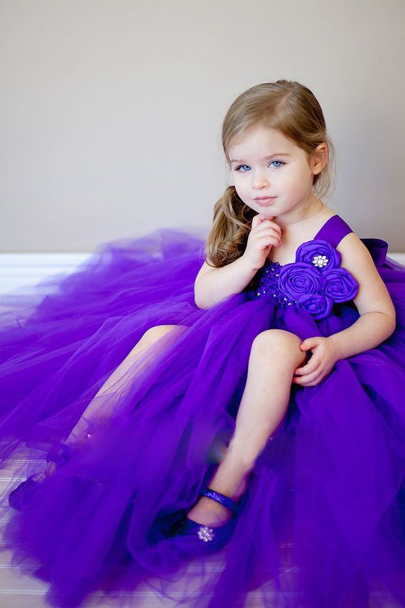 Cute Baby Girl In Purple Dress