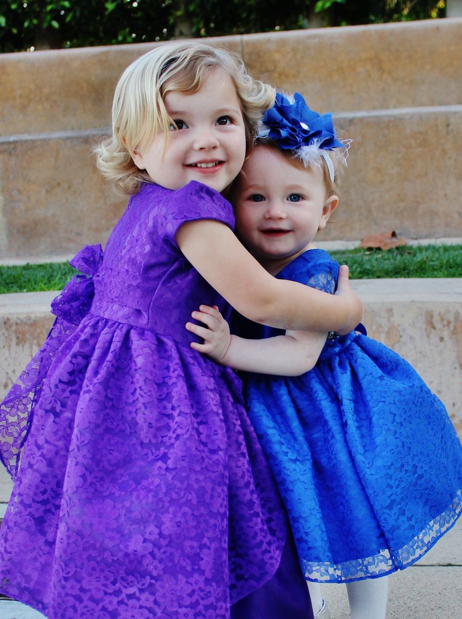 Cute Baby Girl In Purple Dress