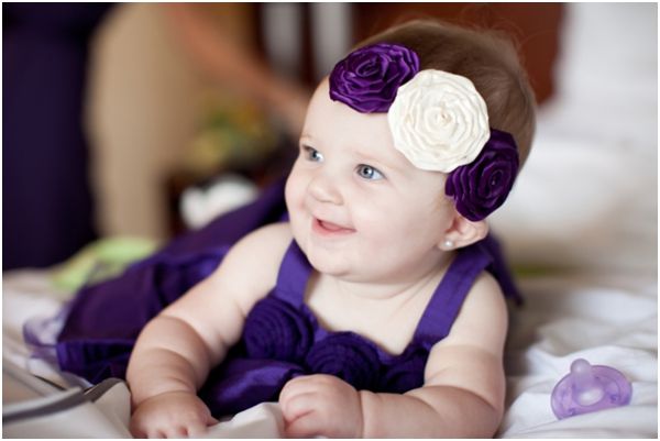 Cute Baby Girl In Purple Dress