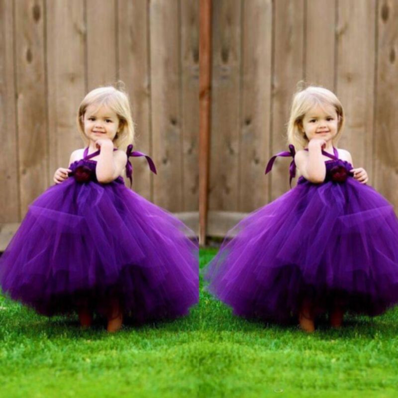 Cute Baby Girl In Purple Dress