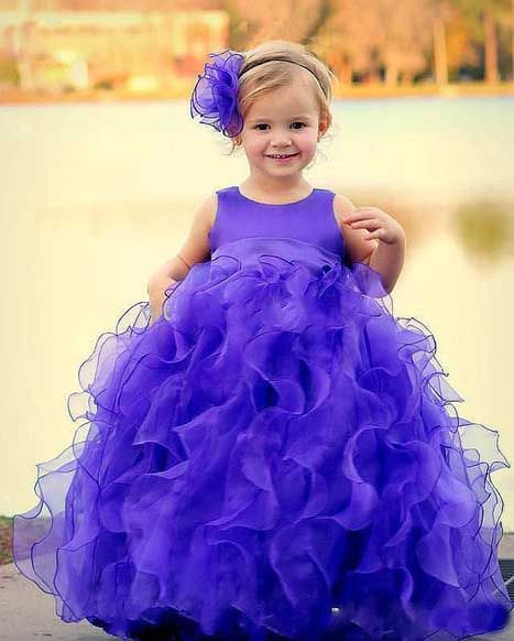 Cute Baby Girl In Purple Dress