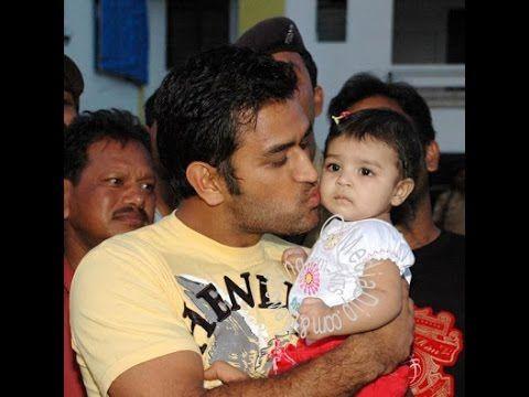 Dhoni with his daughter Ziva Photos