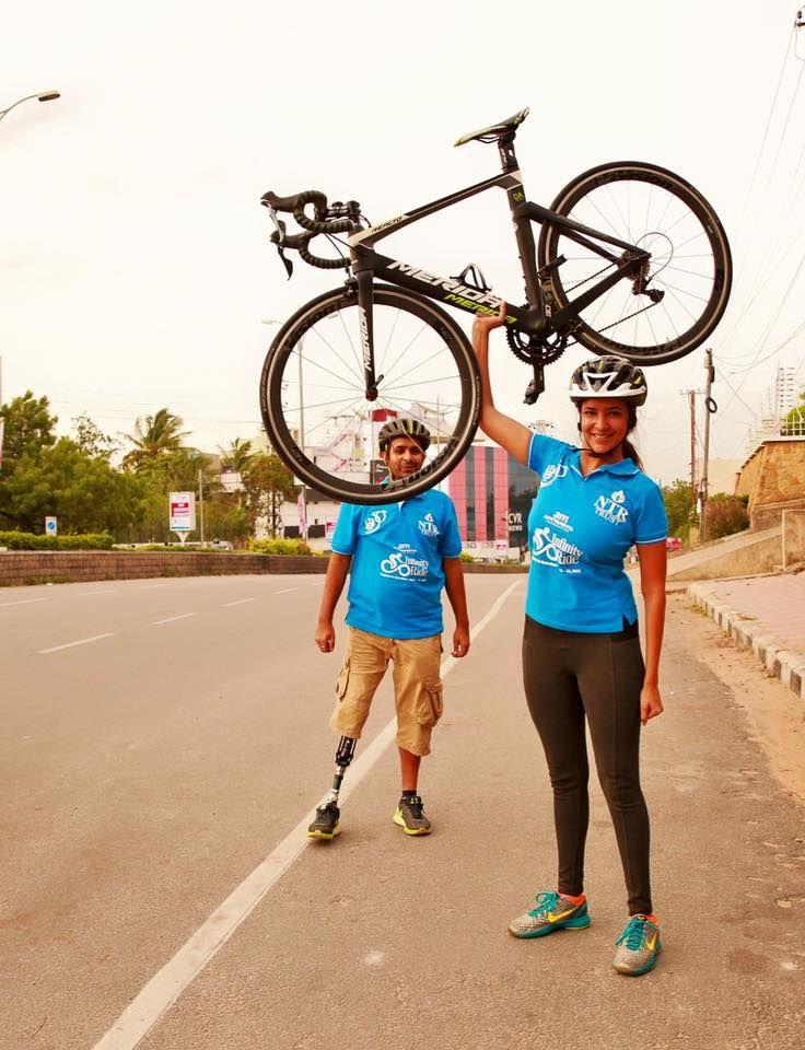 Manchu Lakshmi Riding Bicycle Stills