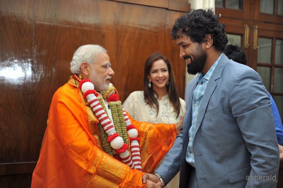 Mohan Babu Family with Modi Pics