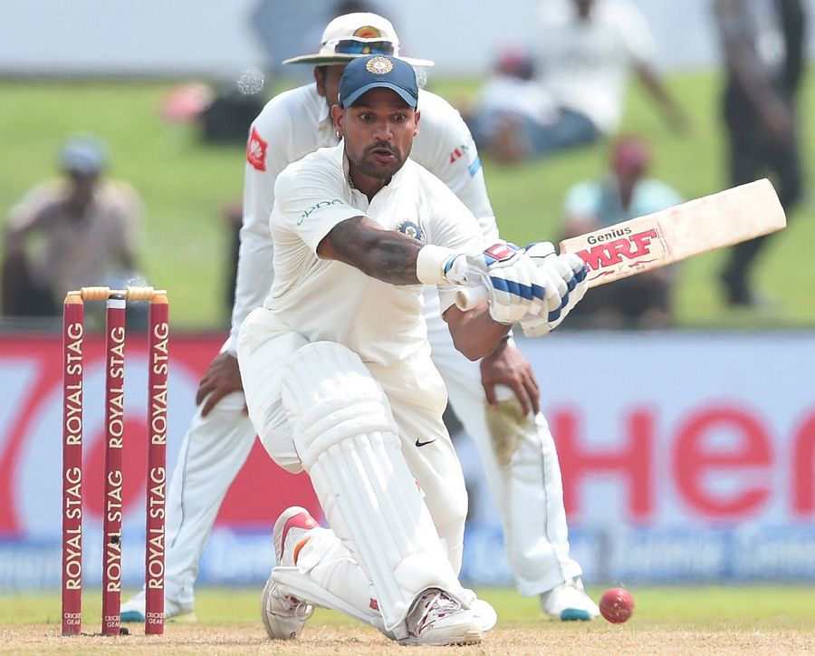 Shikhar Dhawan missed out on a double century Photos