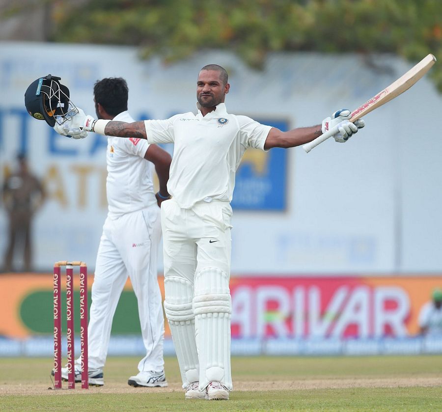 Shikhar Dhawan missed out on a double century Photos