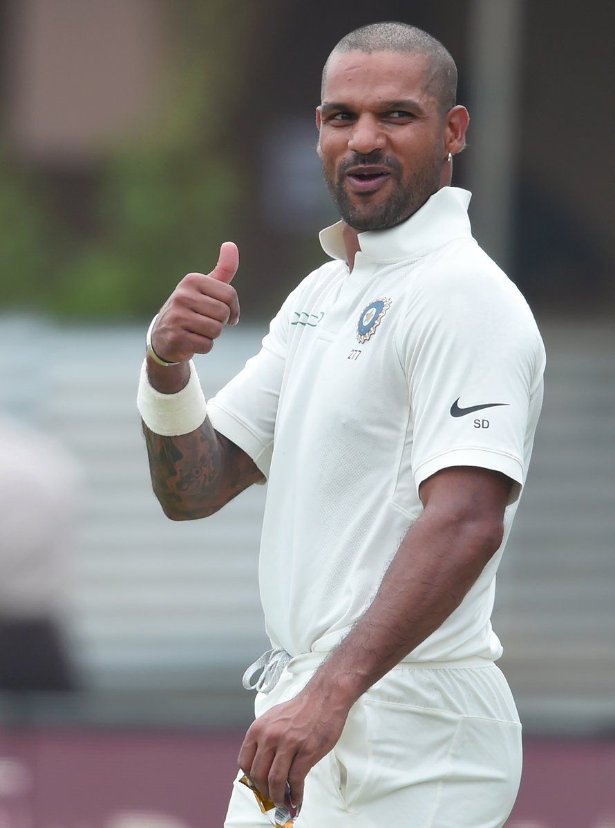 Shikhar Dhawan missed out on a double century Photos