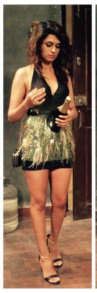 Shraddha Das Relaxing With Shampain Photos