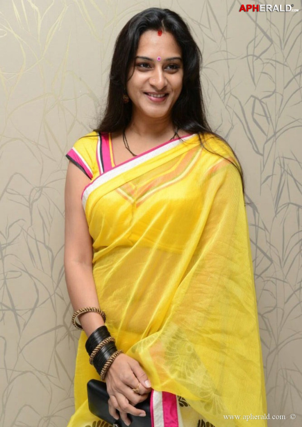 Surekha Vani In Yellow Saree Photos