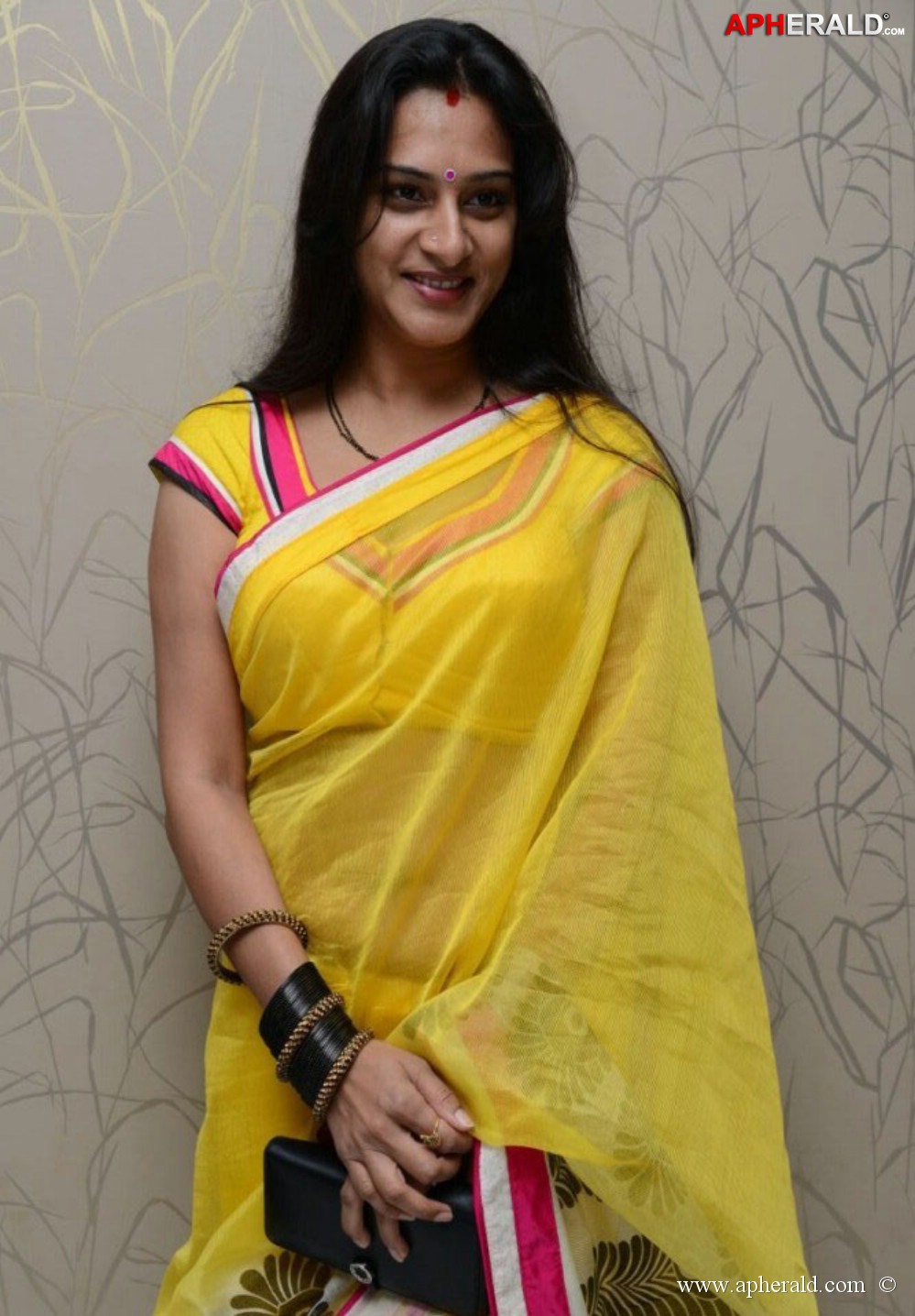 Surekha Vani In Yellow Saree Photos
