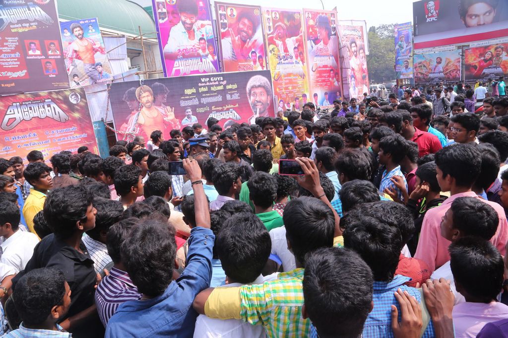 Fans Hungama At Anegan Theaters Photos
