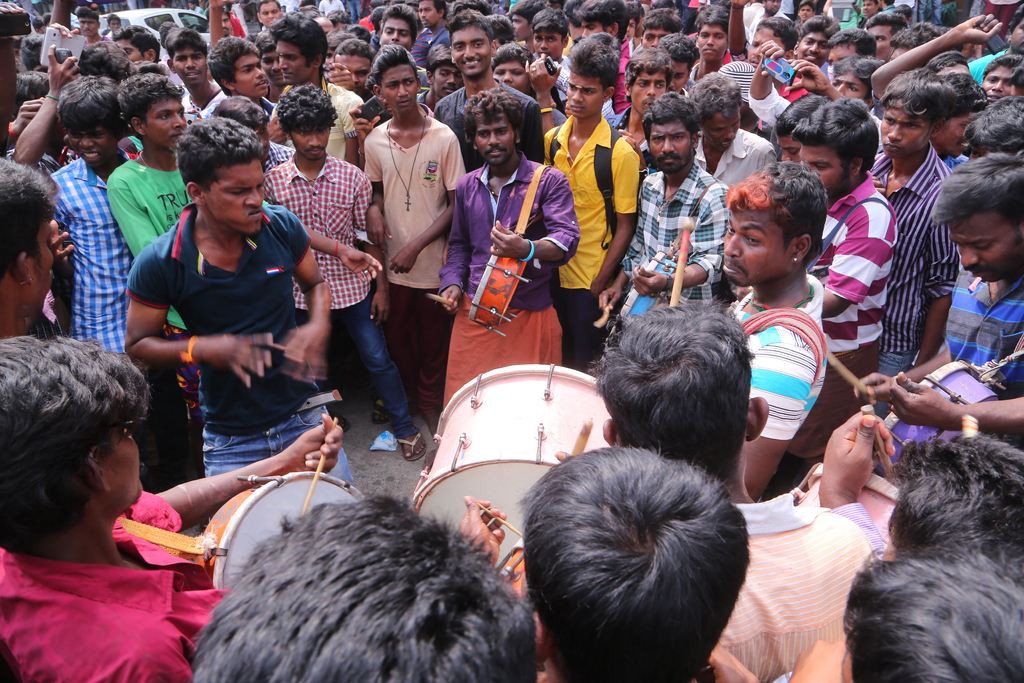 Fans Hungama At Anegan Theaters Photos