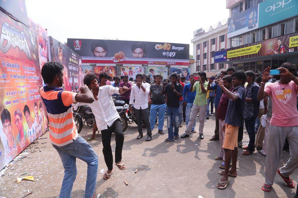 Fans Hungama At Anegan Theaters Photos