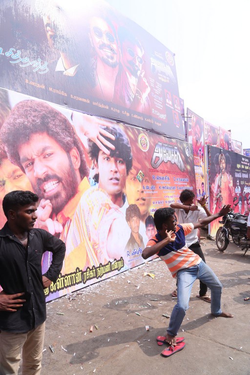 Fans Hungama At Anegan Theaters Photos
