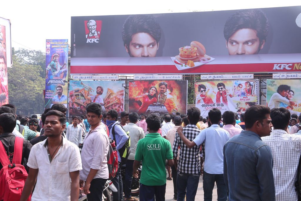 Fans Hungama At Anegan Theaters Photos
