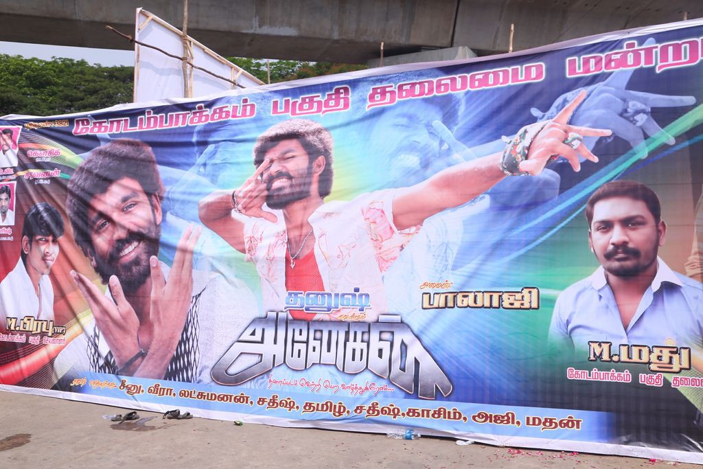 Fans Hungama At Anegan Theaters Photos