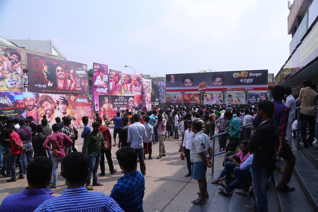 Fans Hungama At Anegan Theaters Photos
