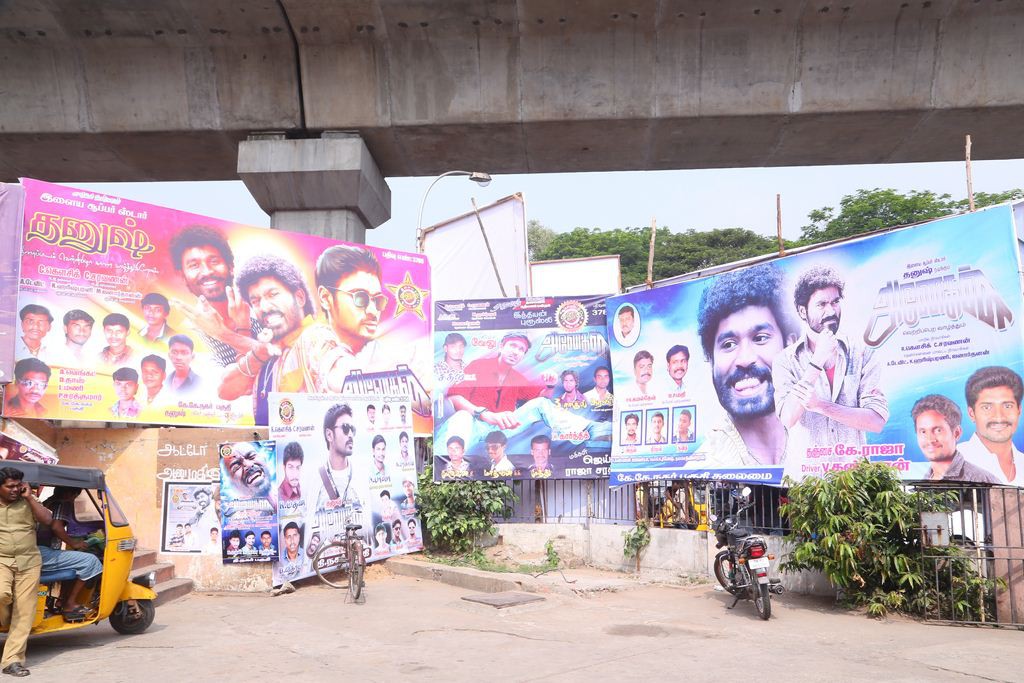 Fans Hungama At Anegan Theaters Photos