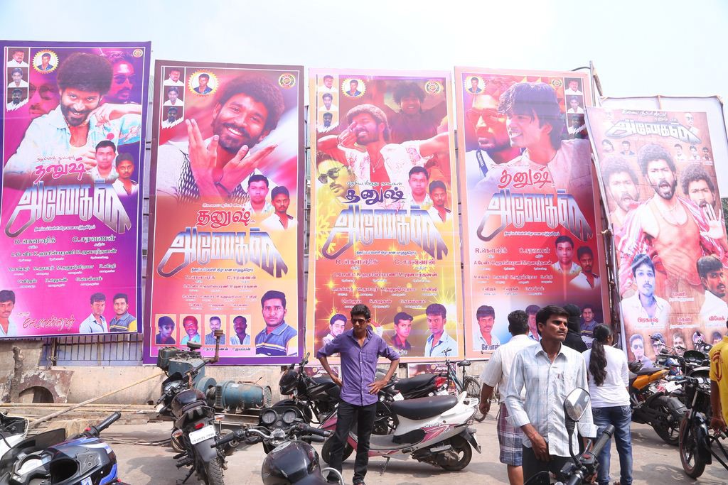 Fans Hungama At Anegan Theaters Photos