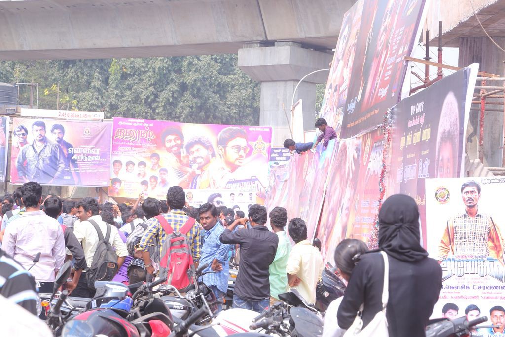 Fans Hungama At Anegan Theaters Photos