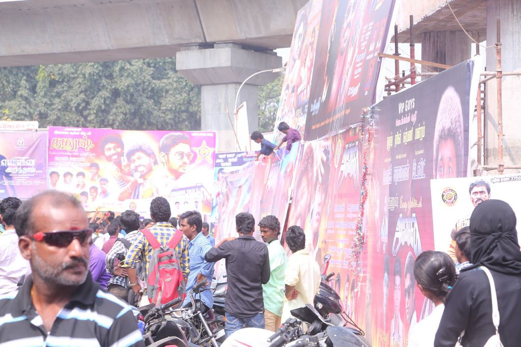 Fans Hungama At Anegan Theaters Photos