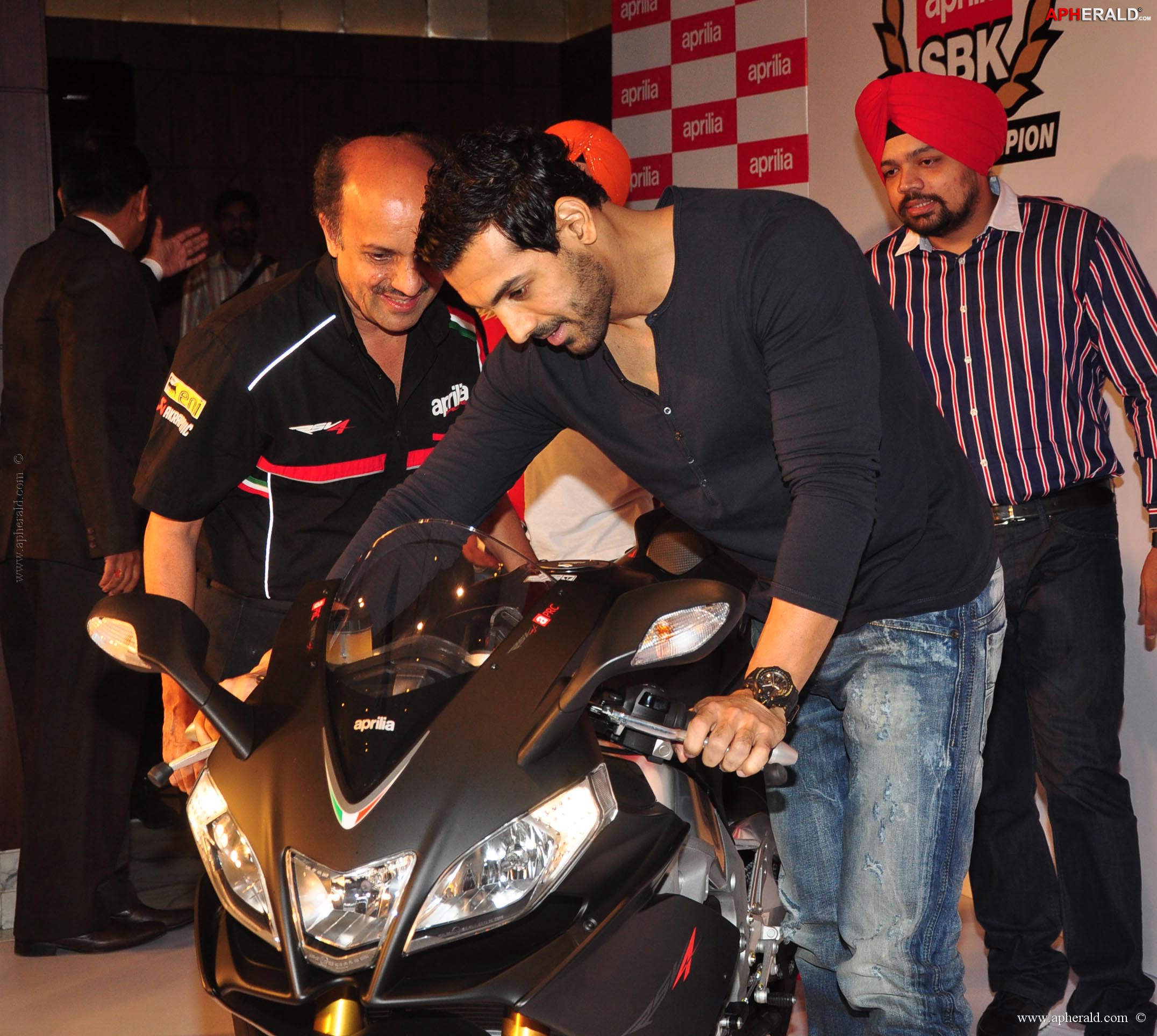 John Abraham owns an Black Aprilia RSV4