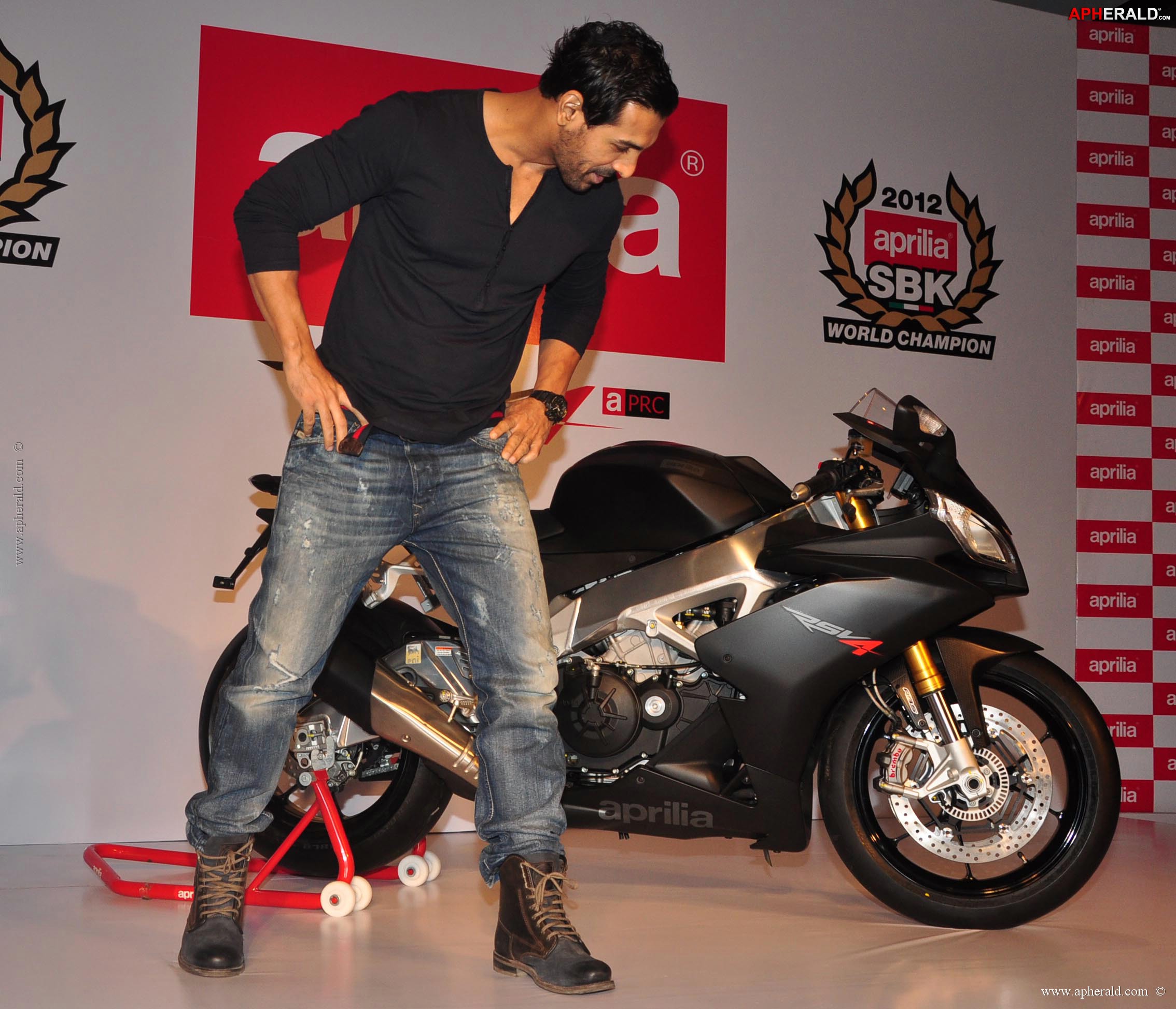 John Abraham owns an Black Aprilia RSV4