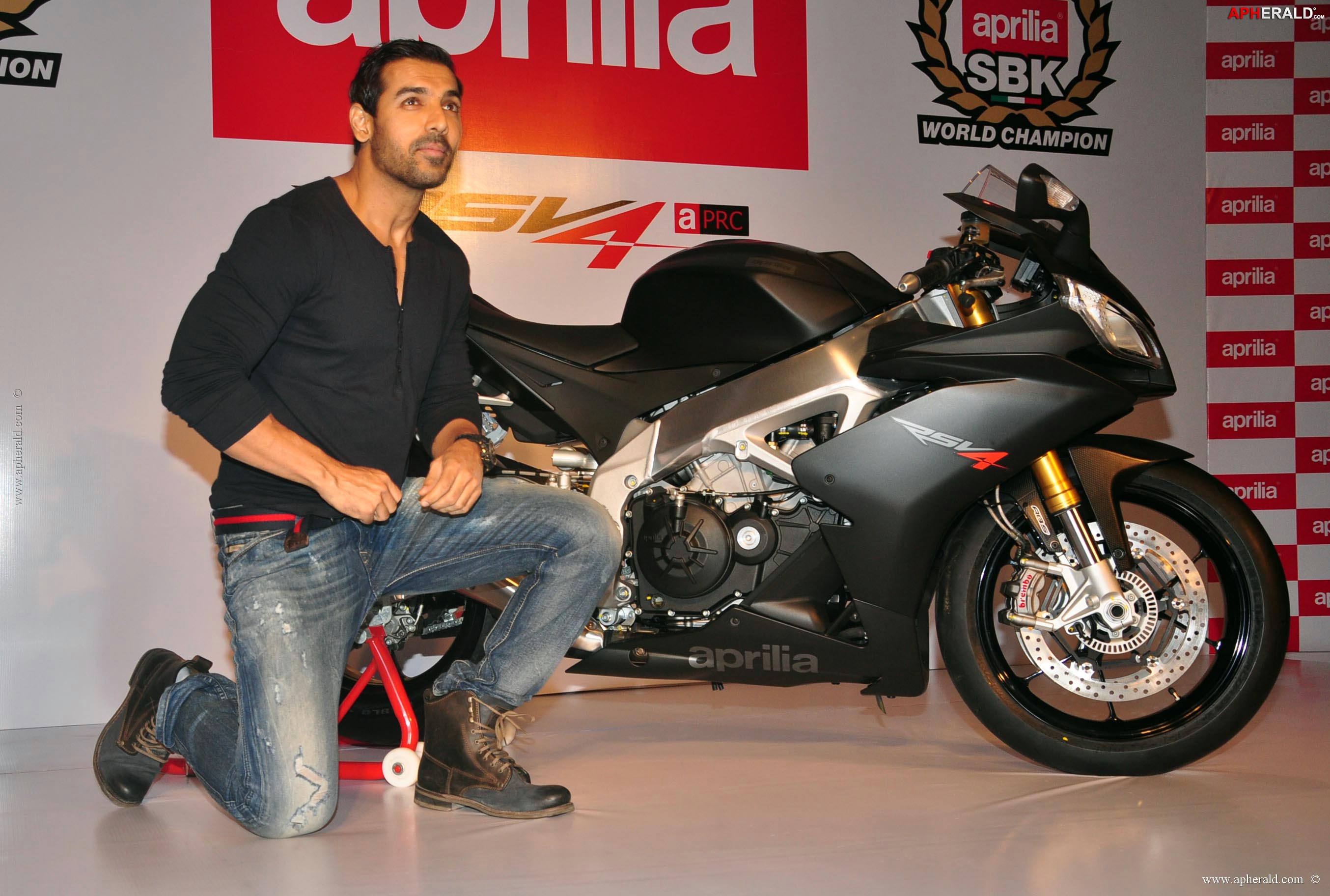 John Abraham owns an Black Aprilia RSV4