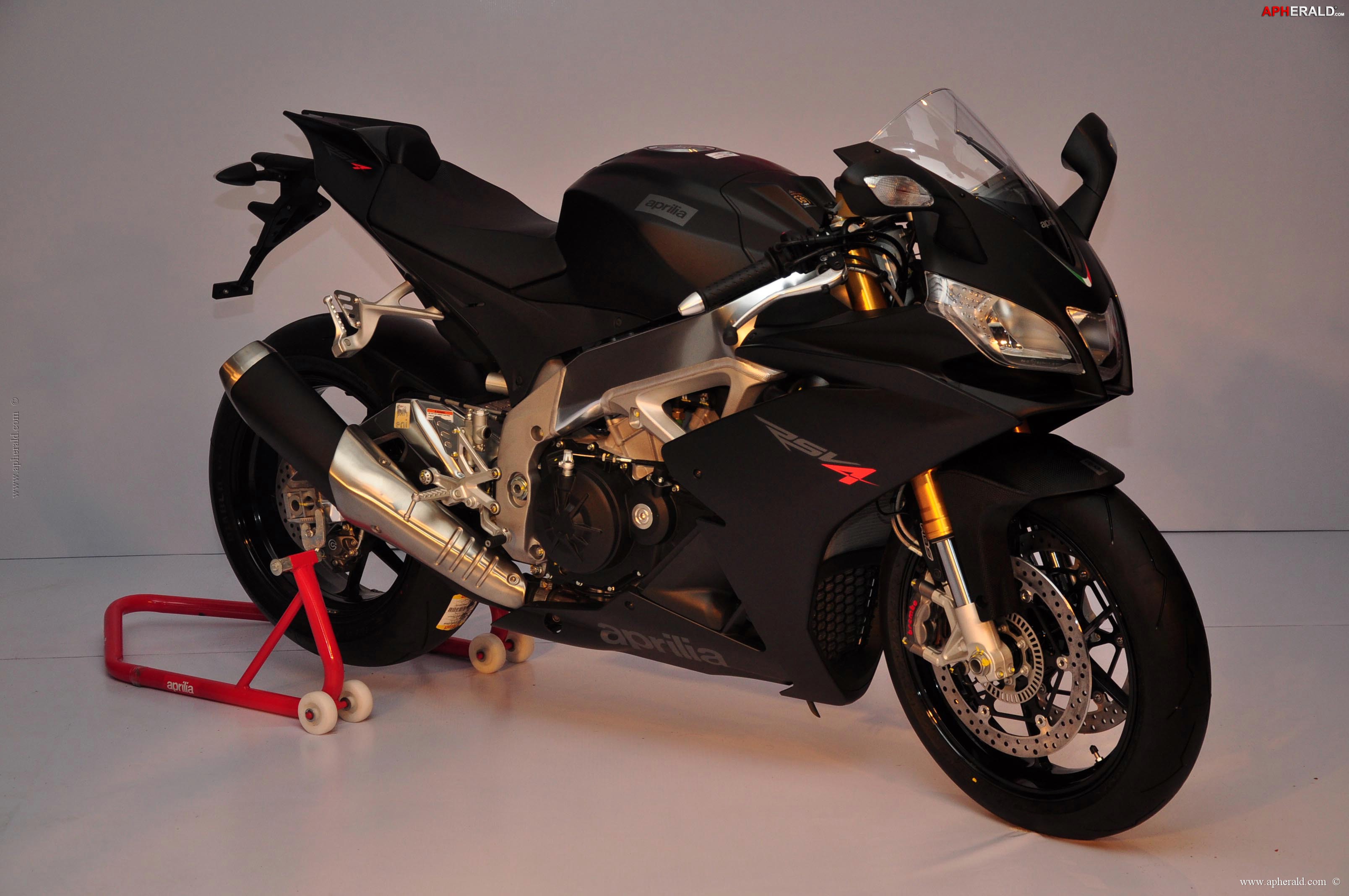 John Abraham owns an Black Aprilia RSV4