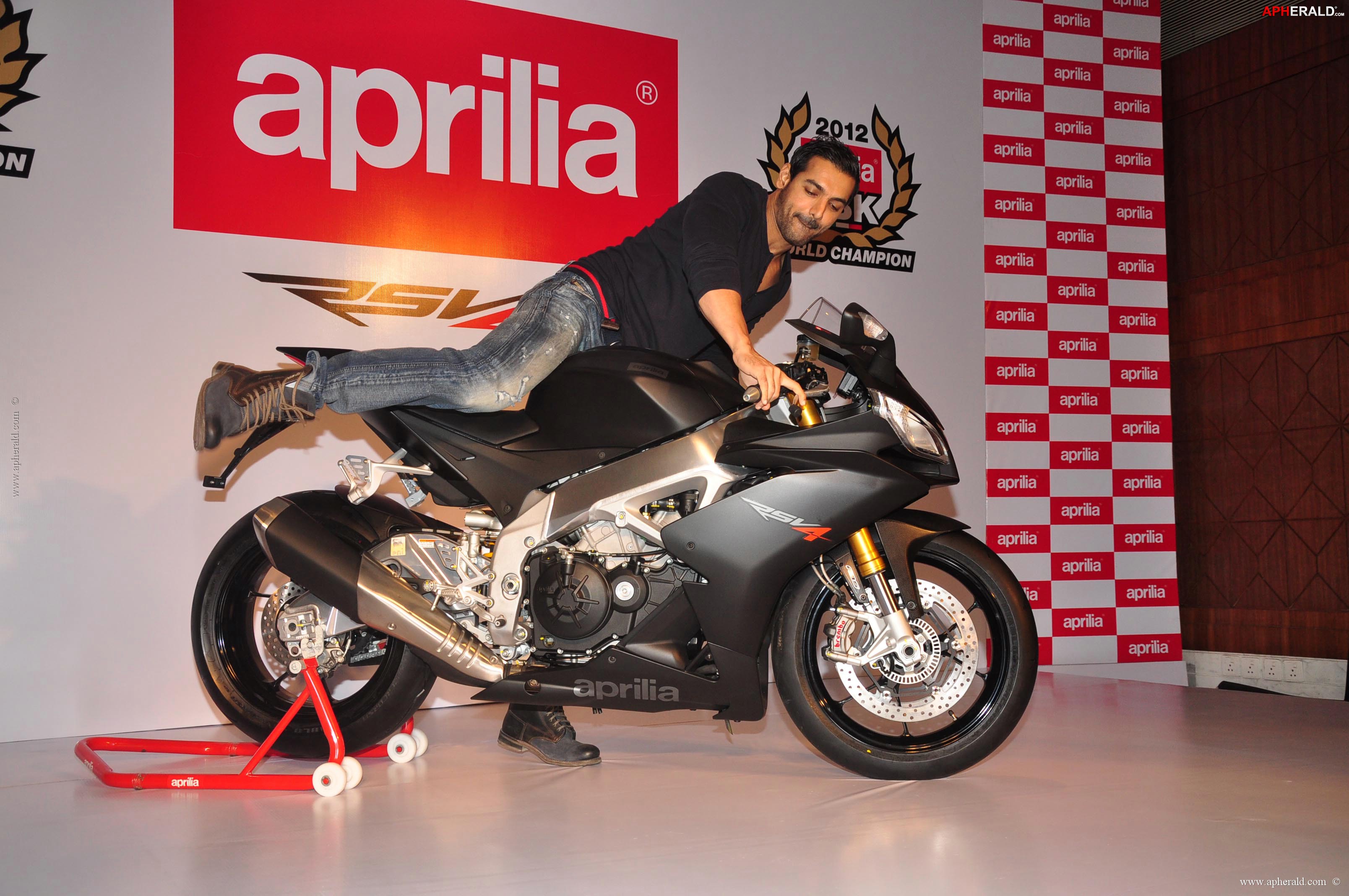 John Abraham owns an Black Aprilia RSV4