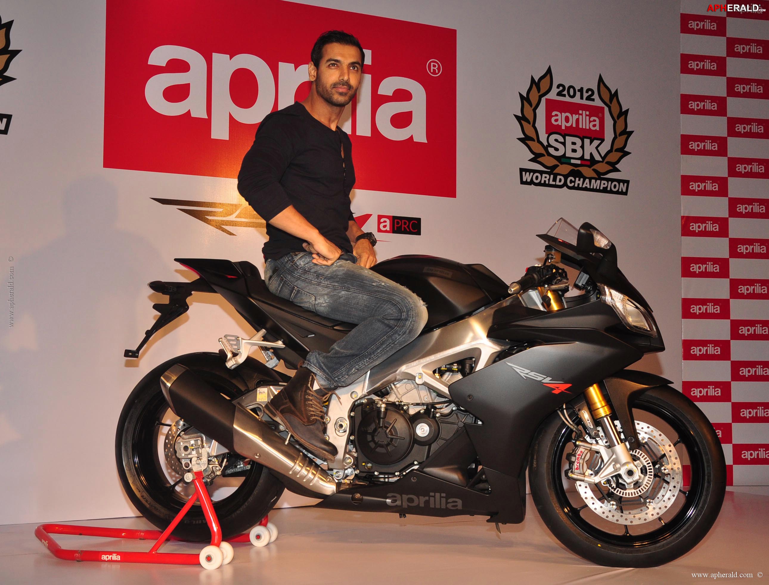 John Abraham owns an Black Aprilia RSV4